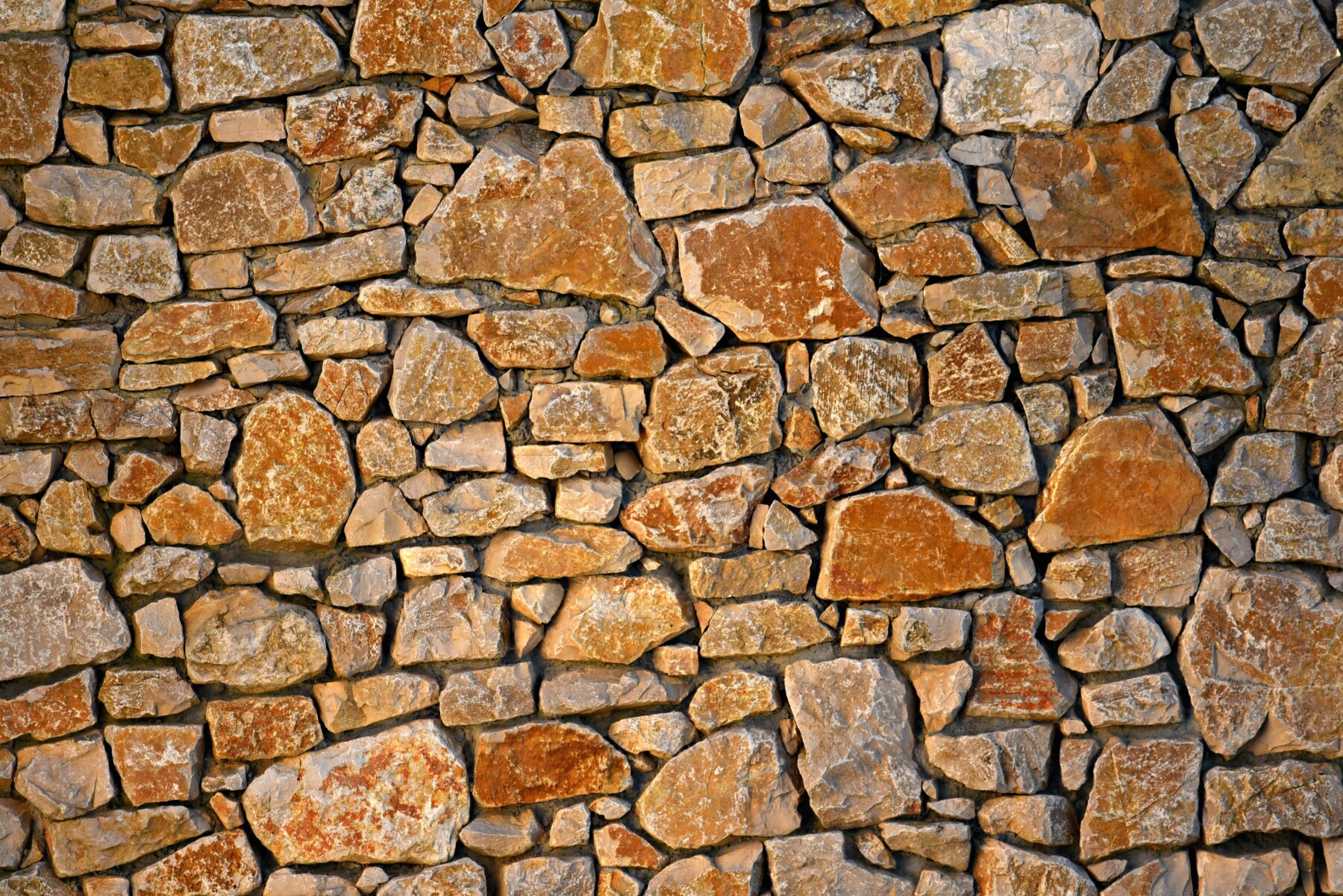 . Whether they are decorative accents or a form of retaining wall, rock walls give outdoor areas timeless appeal and utility. 